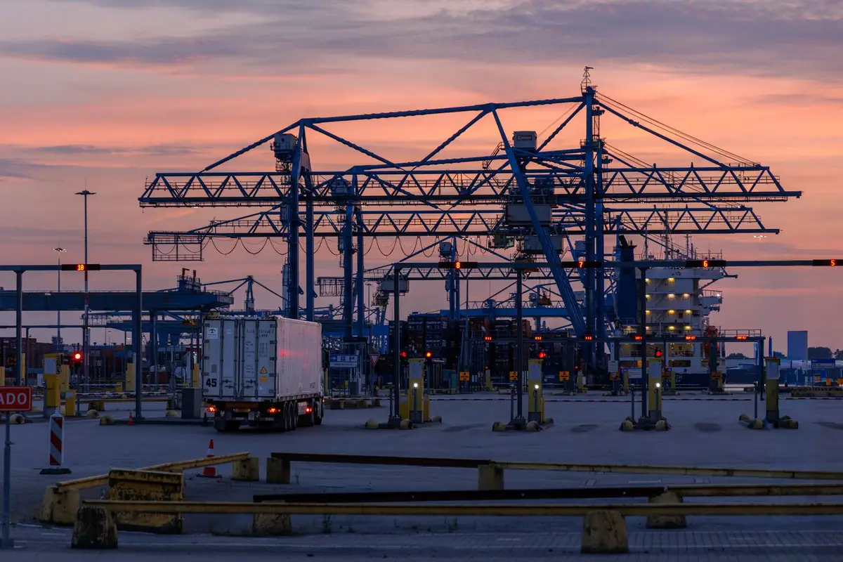 Cargo cranes at sunset in the Port of Rotterdam