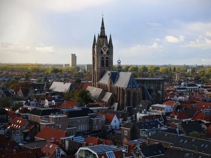 Delft rooftops and church tower from above